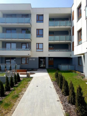 Nowoczesny Apartament w Centrum